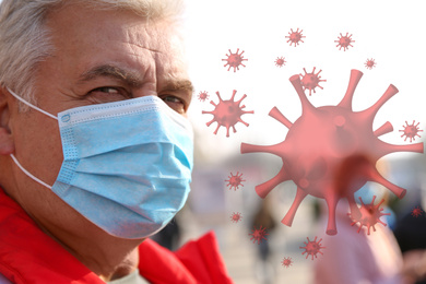 Image of Senior man wearing medical mask outdoors during coronavirus outbreak