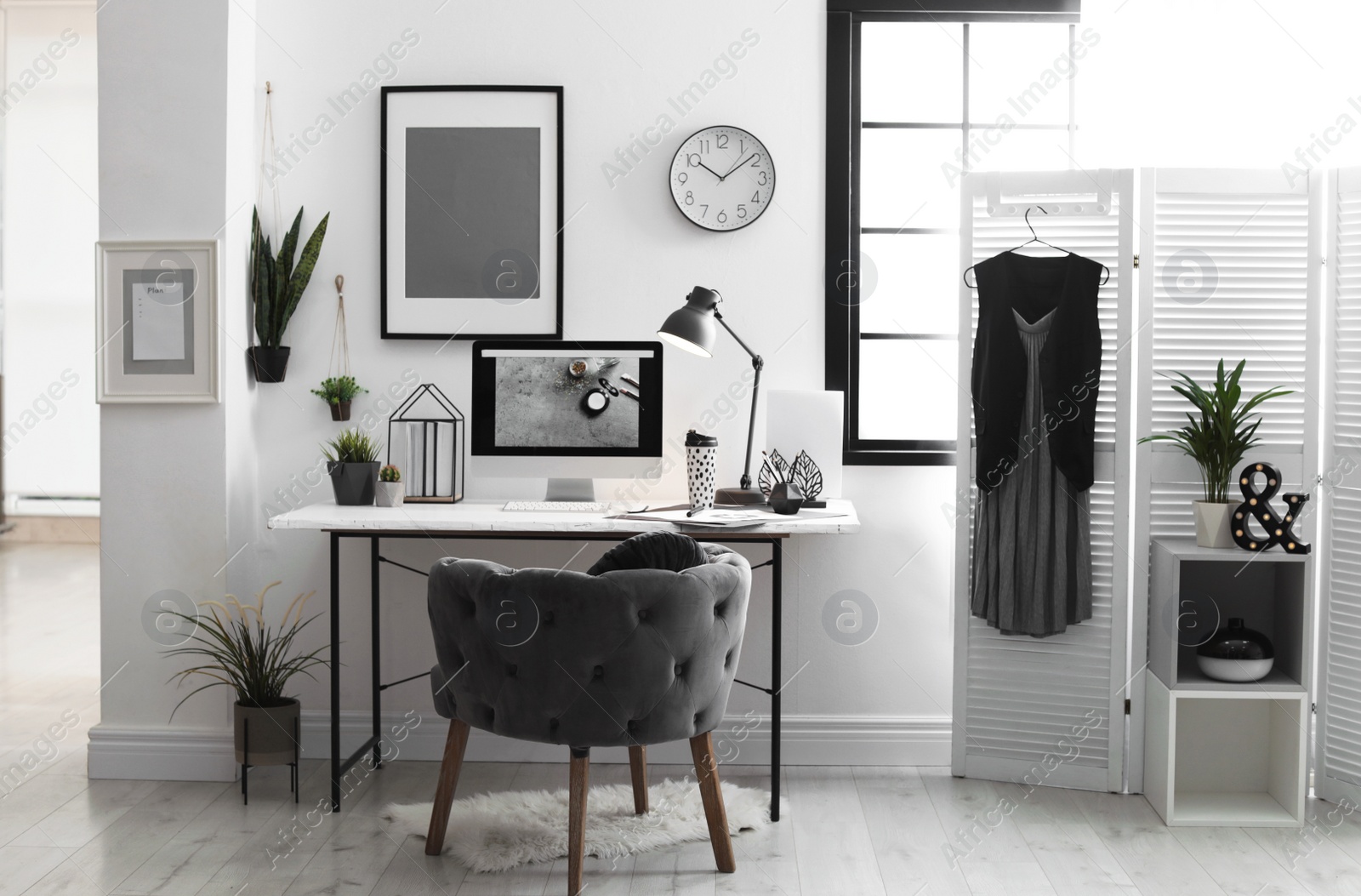 Photo of Stylish workplace with modern computer on desk