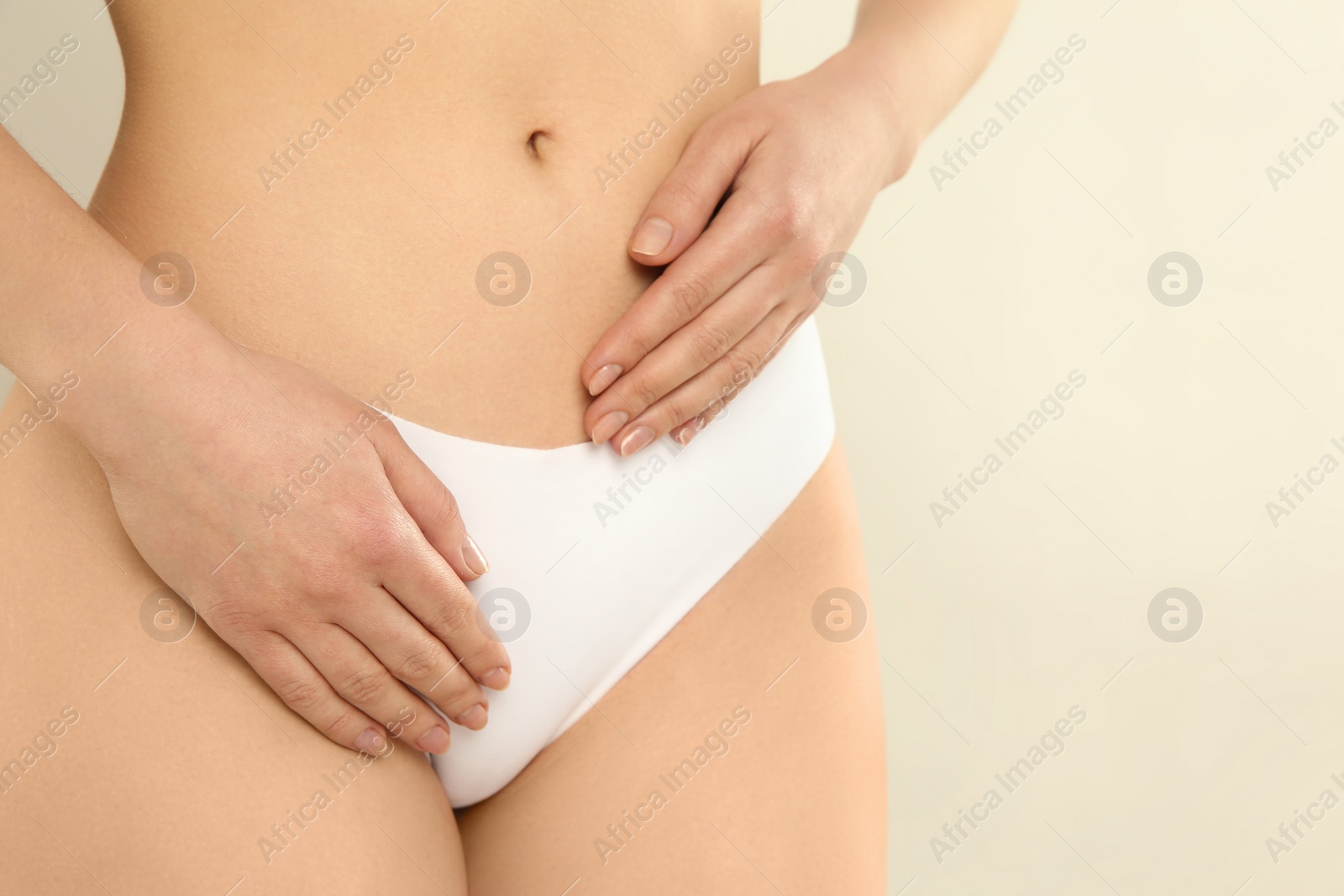 Photo of Gynecology. Woman in underwear on light background, closeup. Space for text