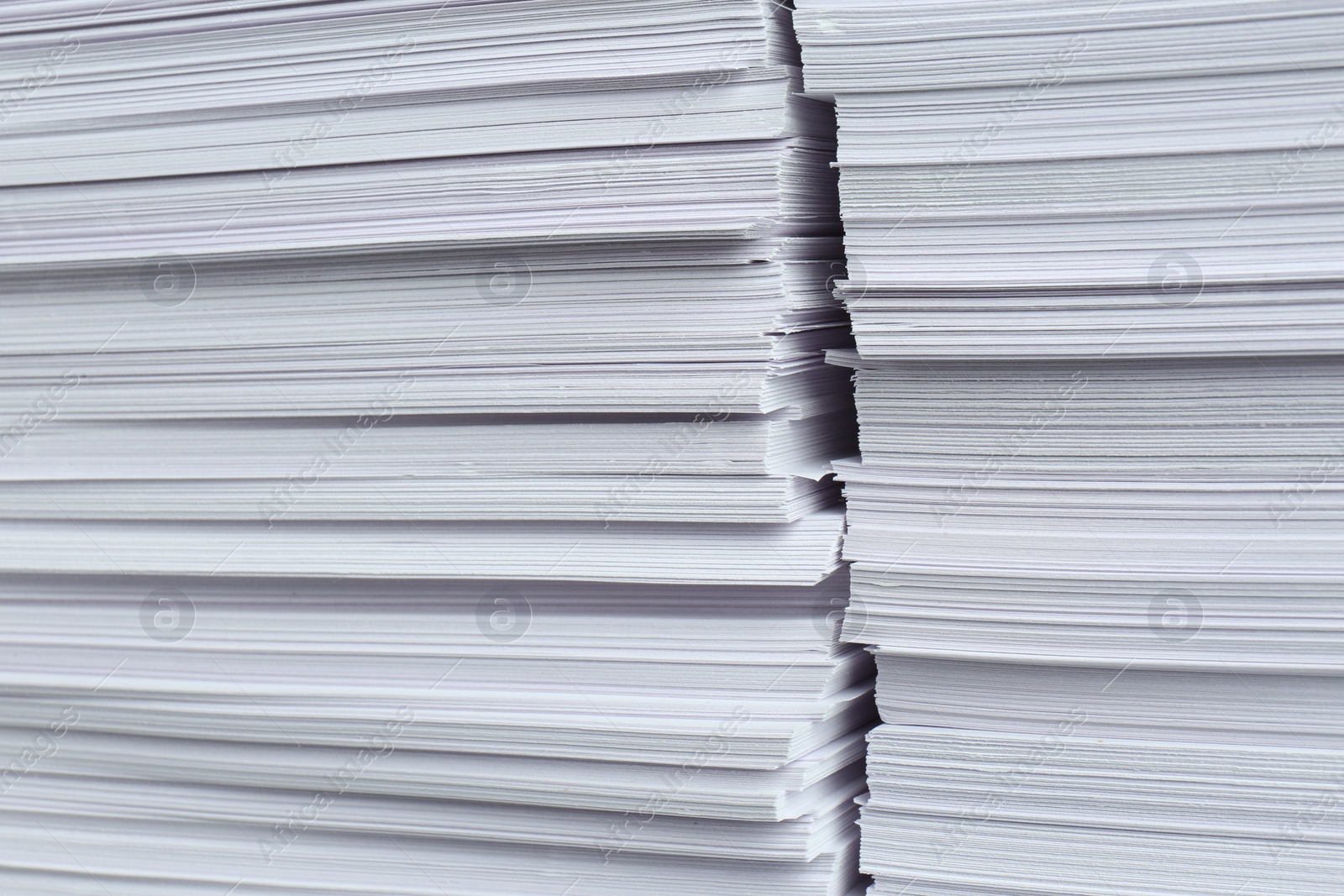 Photo of Stacks of white paper sheets, closeup view