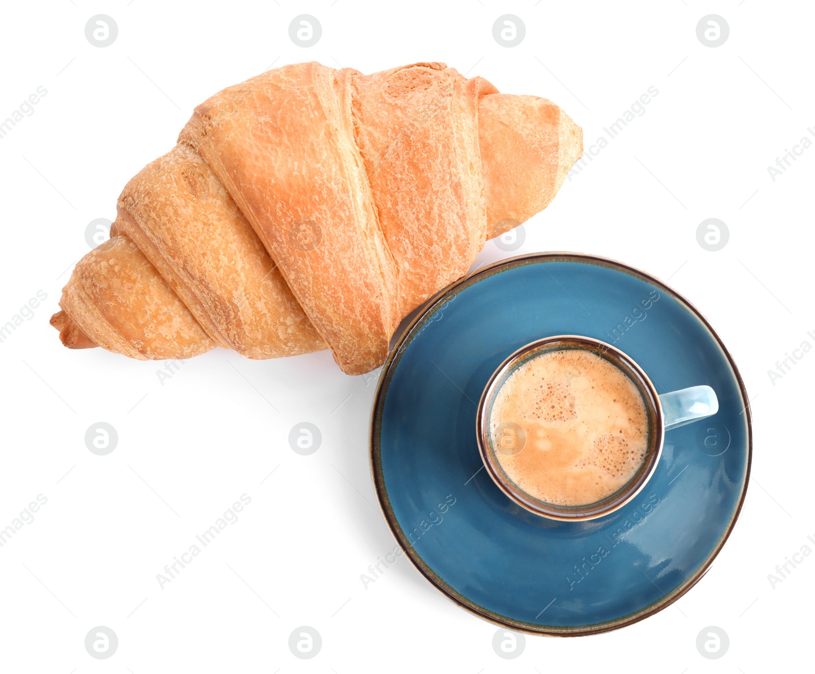 Photo of Tasty fresh croissant and coffee on white background, top view