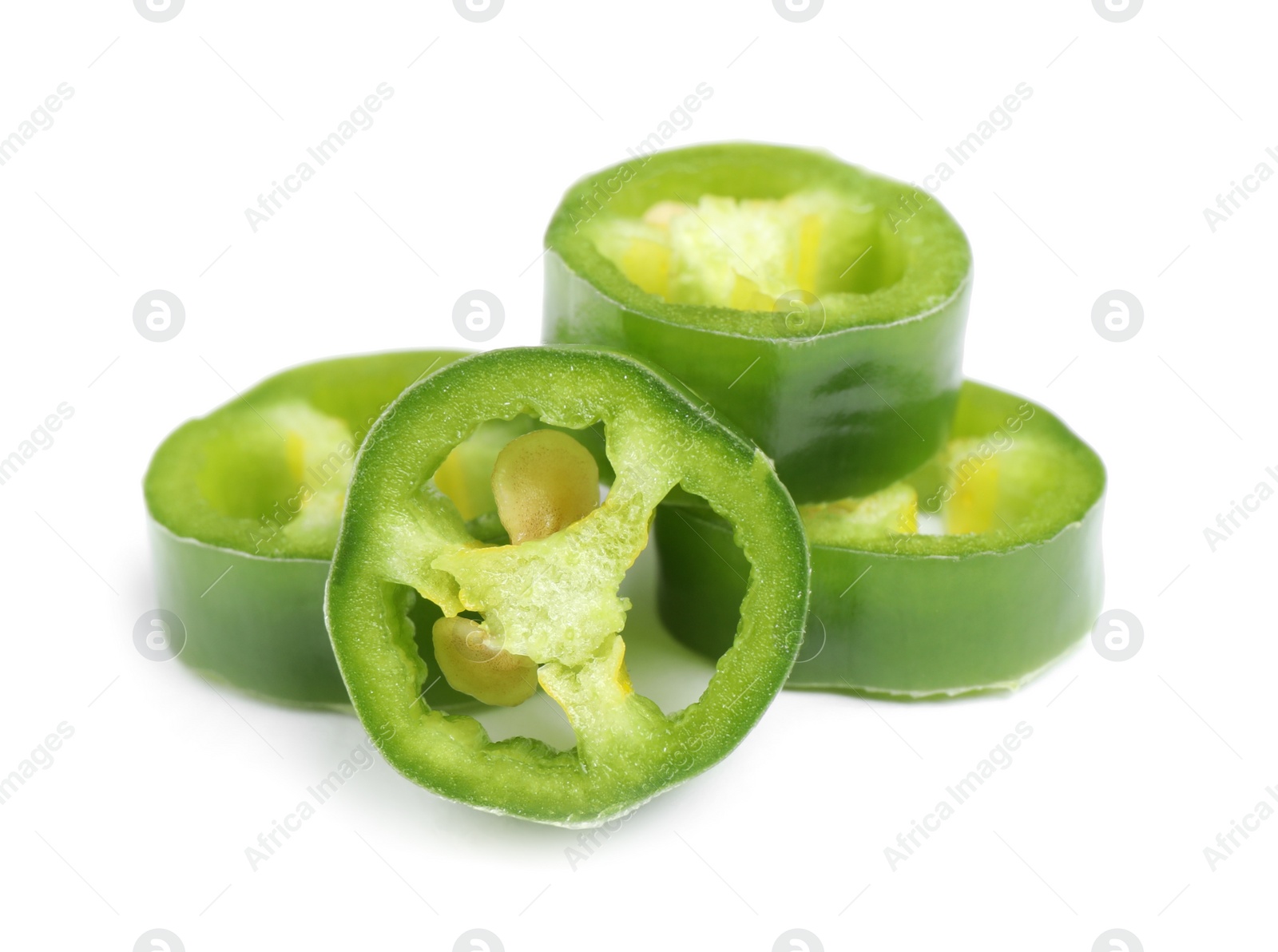 Photo of Cut green hot chili pepper on white background