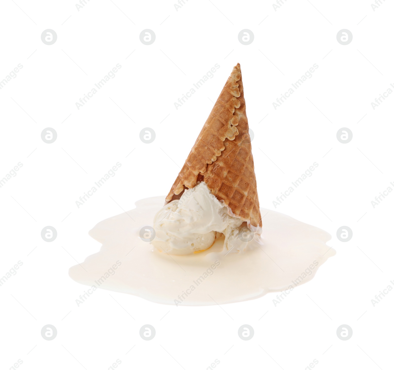 Photo of Melting ice cream in wafer cone isolated on white