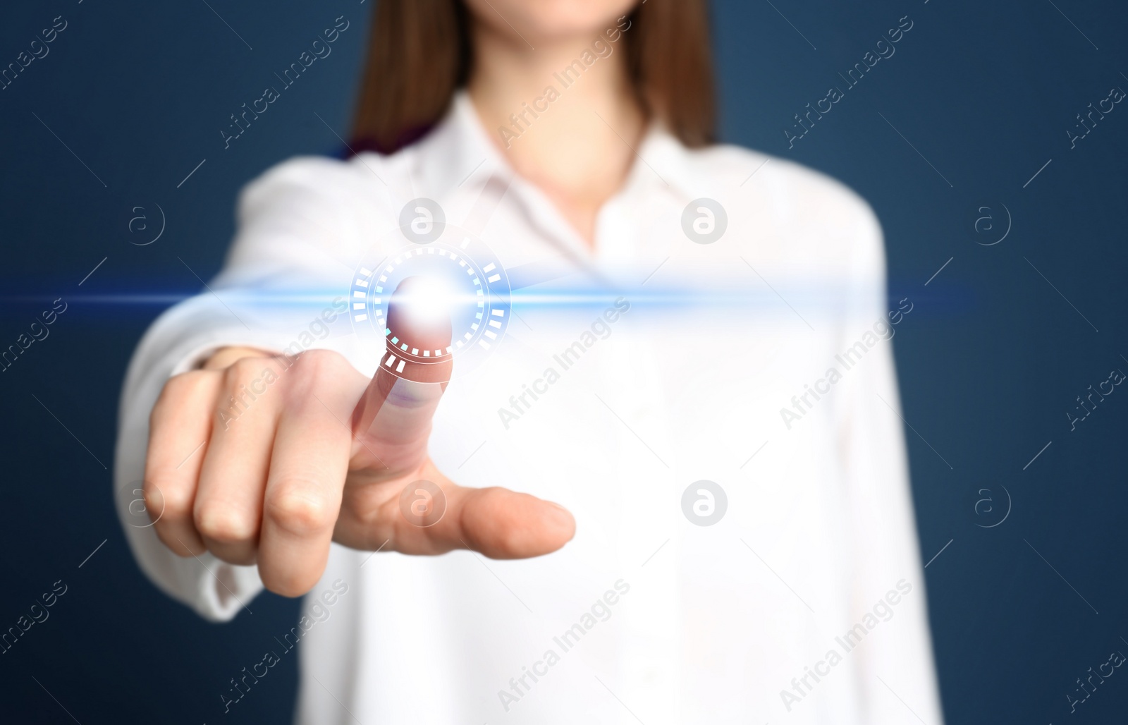 Image of Woman pressing button on virtual screen, closeup