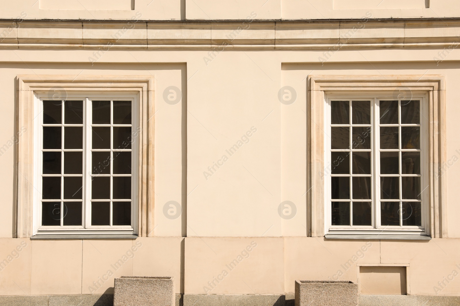 Photo of Building with windows on sunny day, view from outdoors