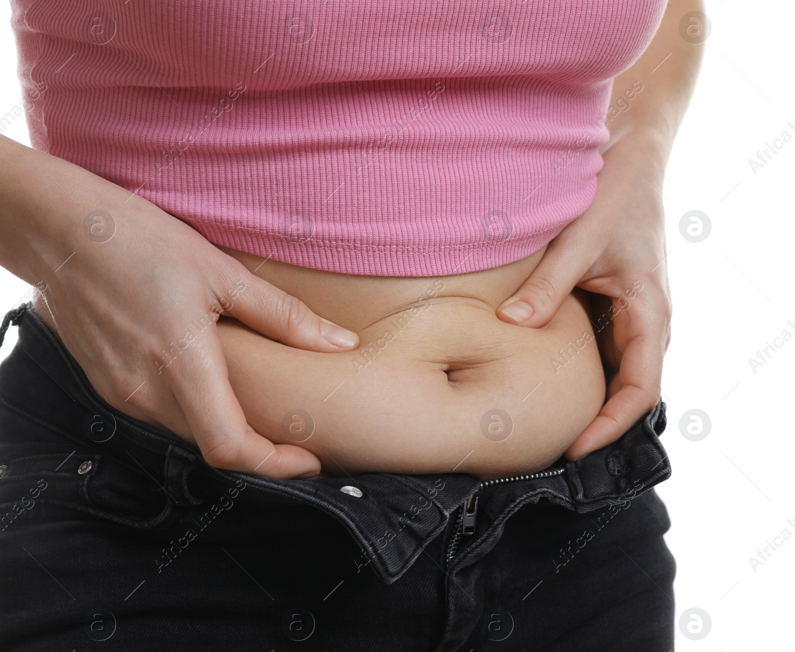 Photo of Woman touching belly fat on white background, closeup. Overweight problem