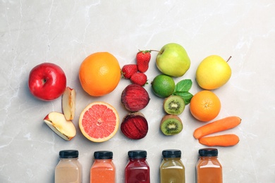 Photo of Flat lay composition with healthy detox smoothies and ingredients on light background