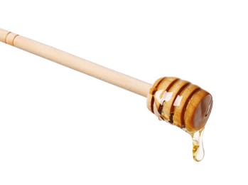 Photo of Natural honey dripping from dipper on white background