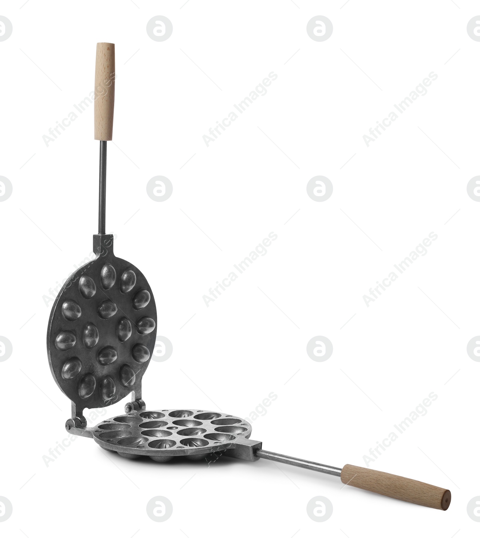 Photo of Walnut cookie mold with wooden handle isolated on white