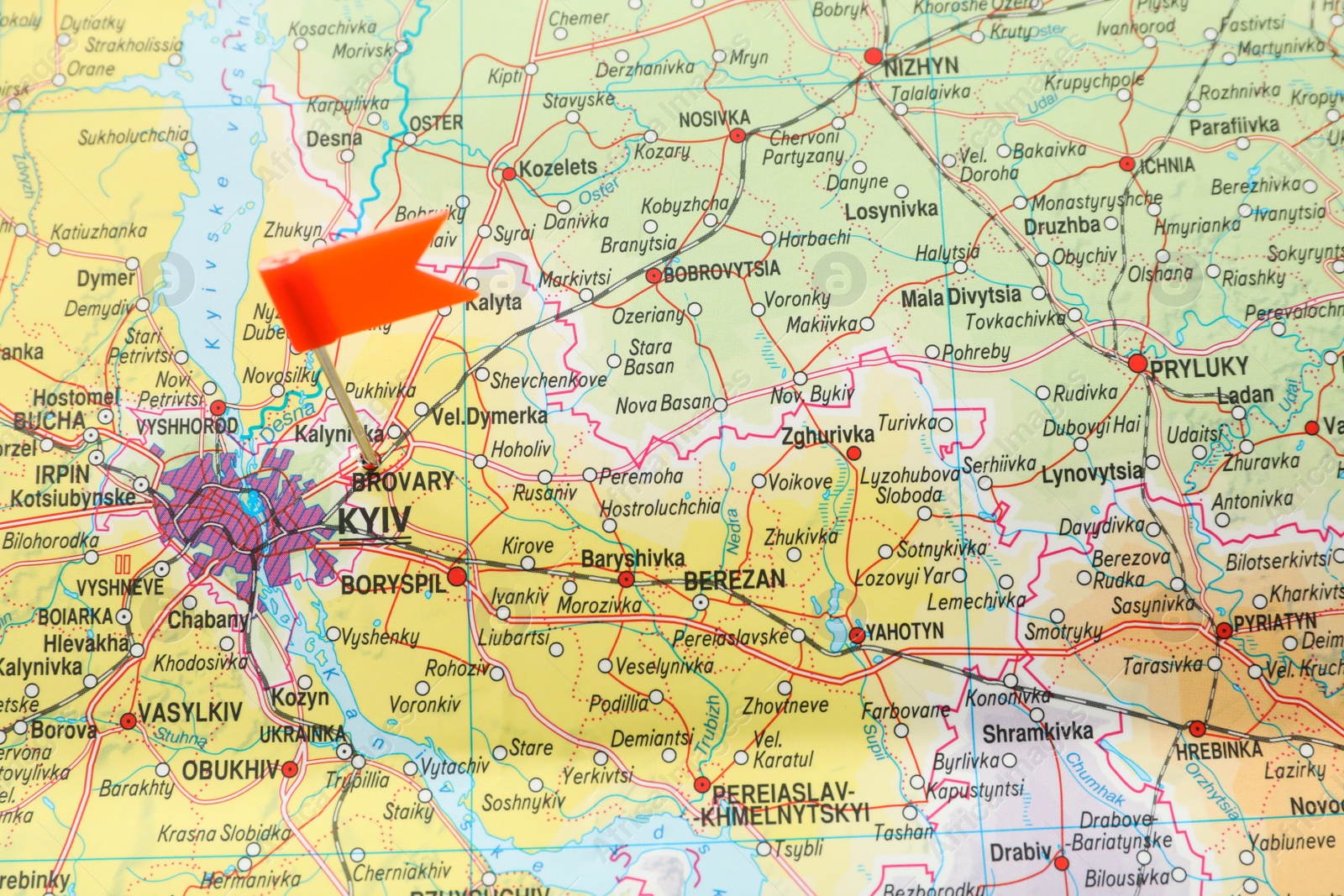 Photo of MYKOLAIV, UKRAINE - NOVEMBER 09, 2020: Brovary city near Kyiv marked with push pin on map of Ukraine, closeup