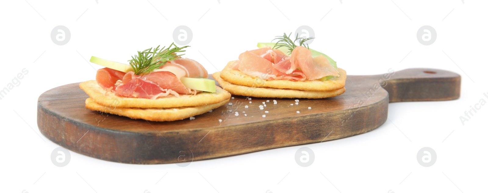 Photo of Delicious crackers with avocado, prosciutto and dill on white background