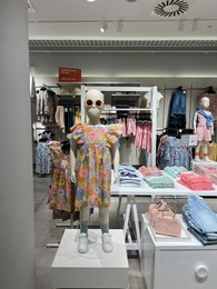 WARSAW, POLAND - JULY 23, 2022: Modern boutique with stylish children clothes