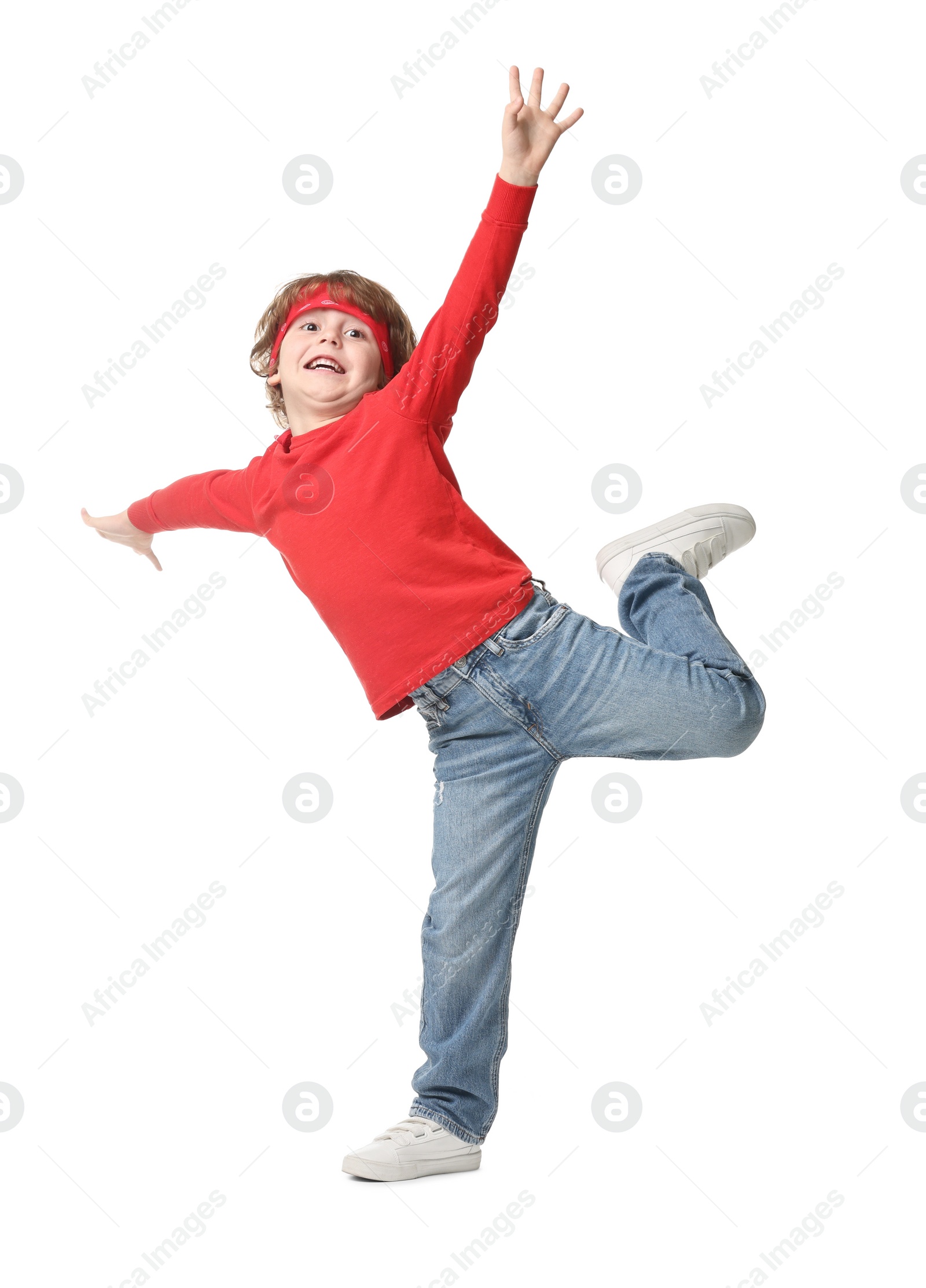 Photo of Happy little boy dancing on white background