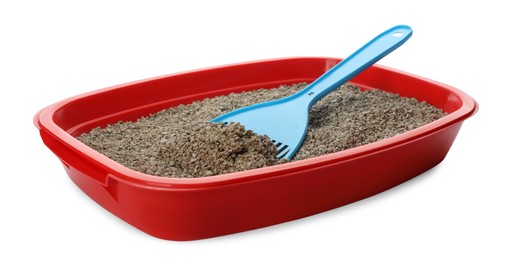 Photo of Red cat litter tray with filler and scoop isolated on white