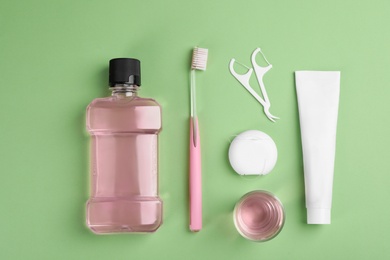 Flat lay composition with oral care products on color background. Teeth hygiene