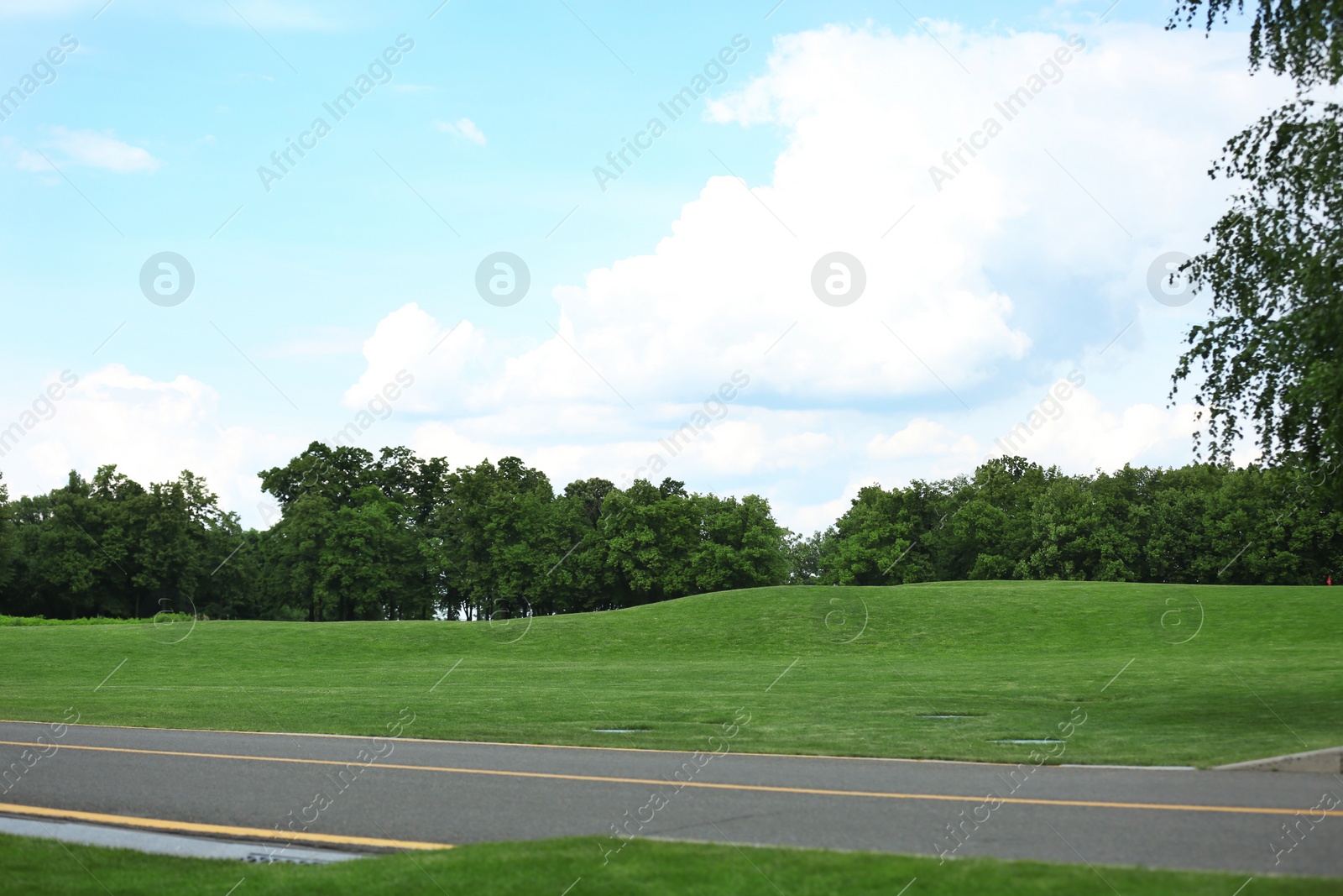 Photo of Beautiful view of golf course with green grass