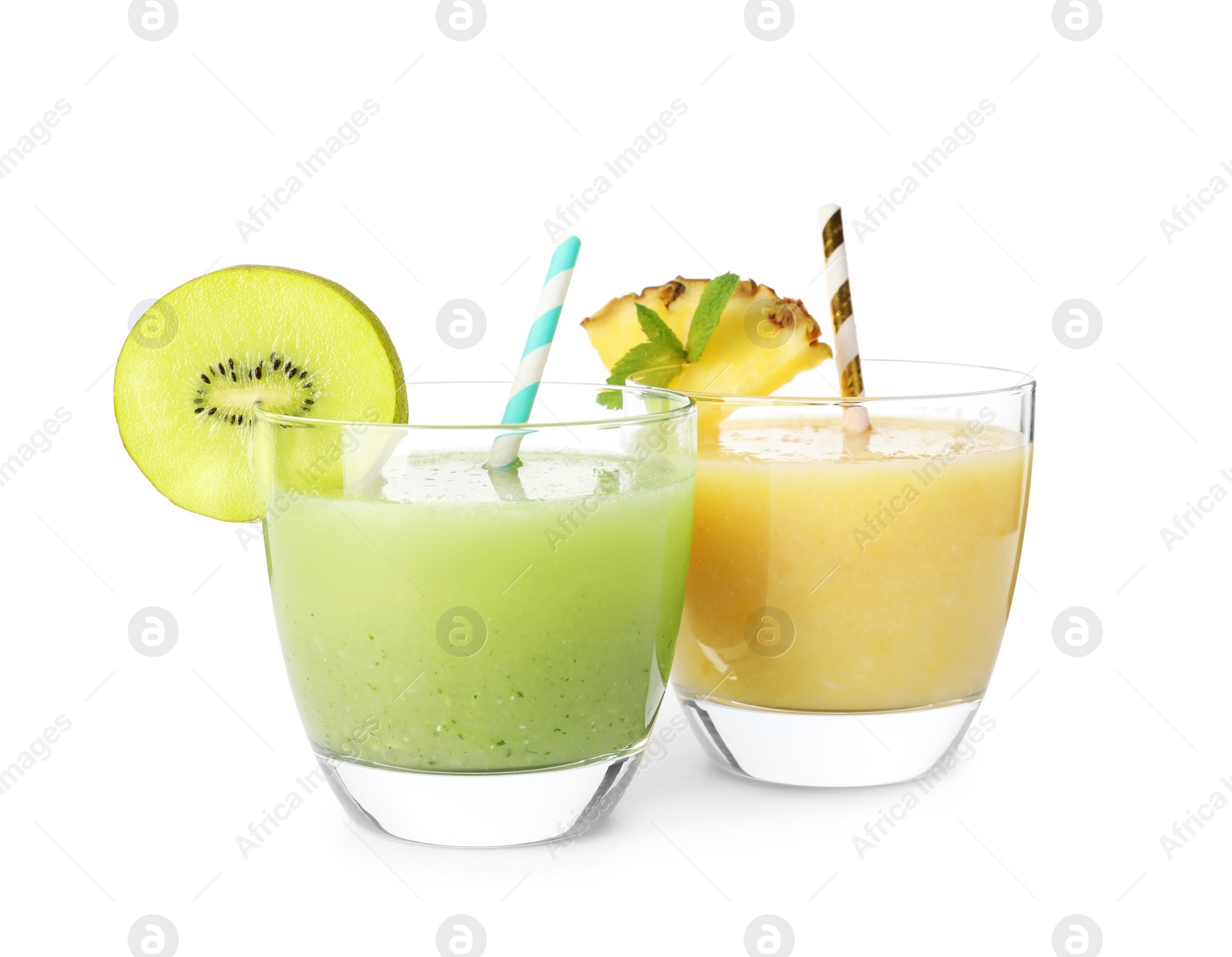 Photo of Delicious colorful juices in glasses isolated on white