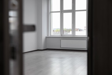 Modern empty office, view through open door