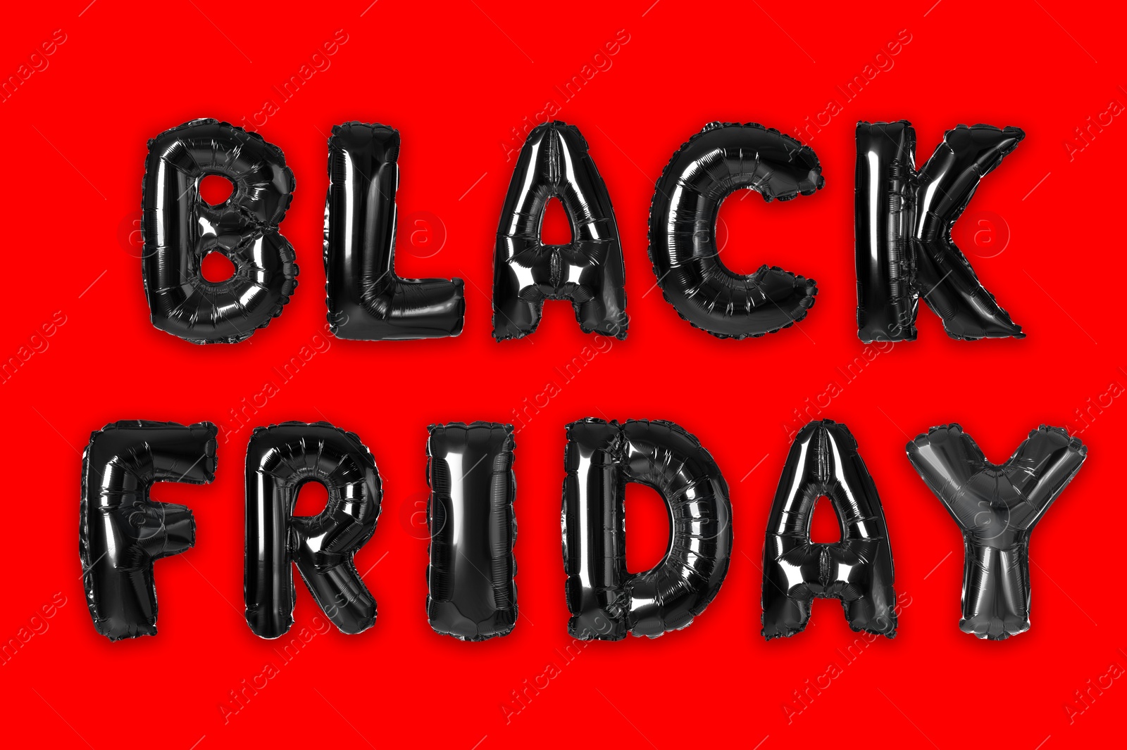 Image of Text BLACK FRIDAY made of foil balloons on red background