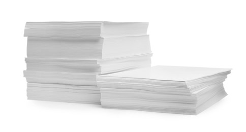 Photo of Stacks of paper sheets on white background