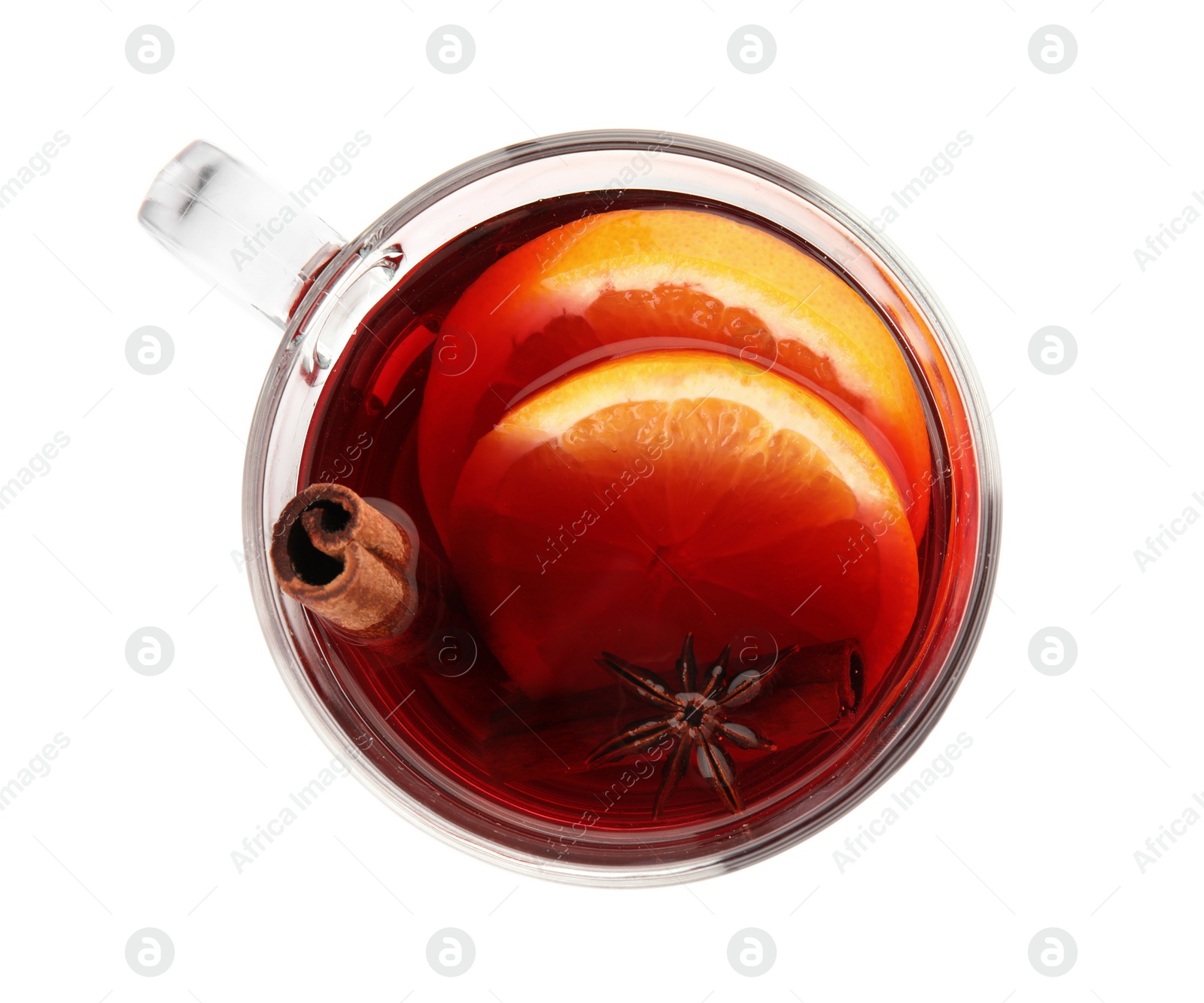 Photo of Glass cup of mulled wine isolated on white, top view