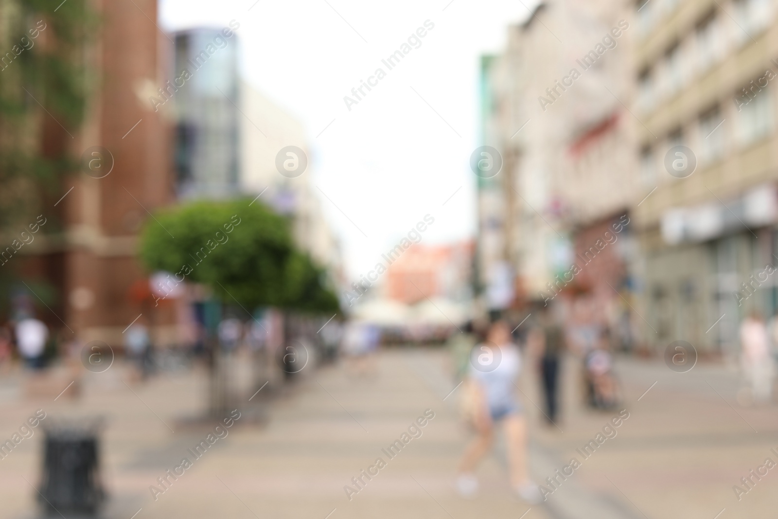 Photo of Blurred view of city street on sunny day