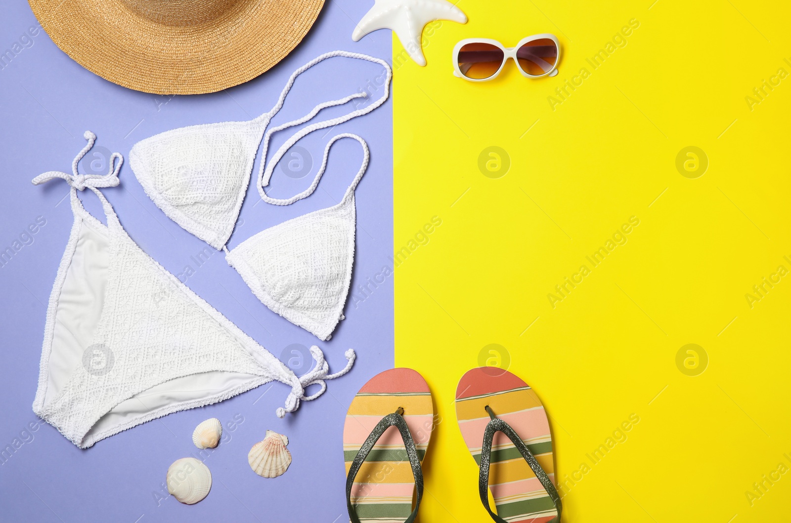 Photo of Flat lay composition with stylish bikini on color background. Space for text