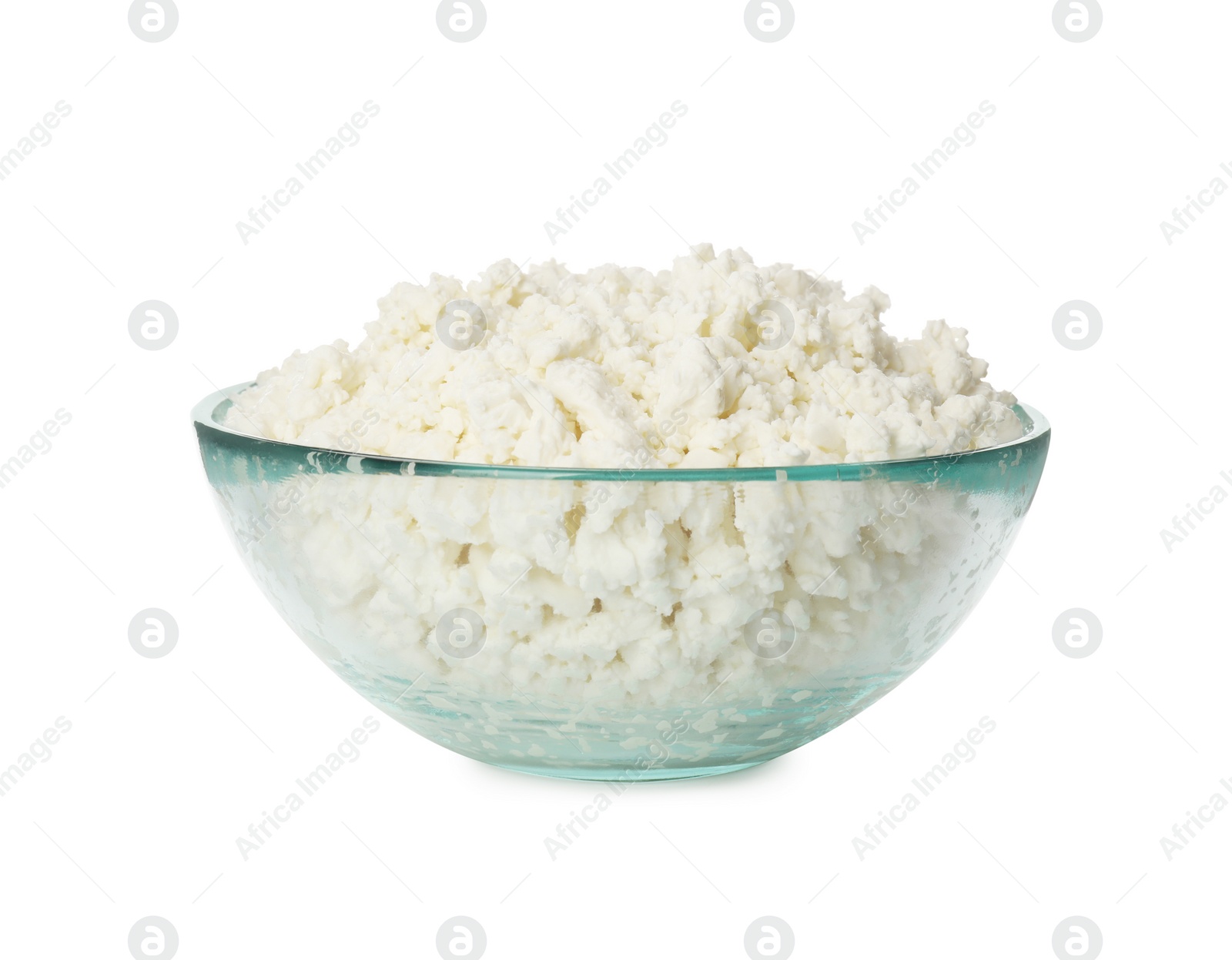 Photo of Delicious fresh cottage cheese in bowl isolated on white