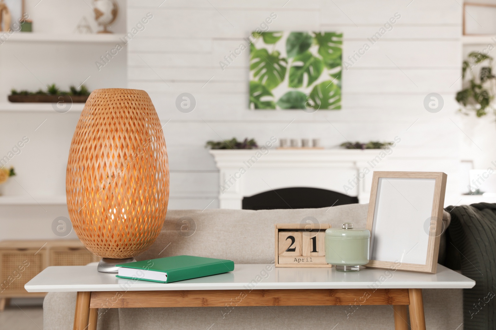 Photo of Console table with stylish decor in living room