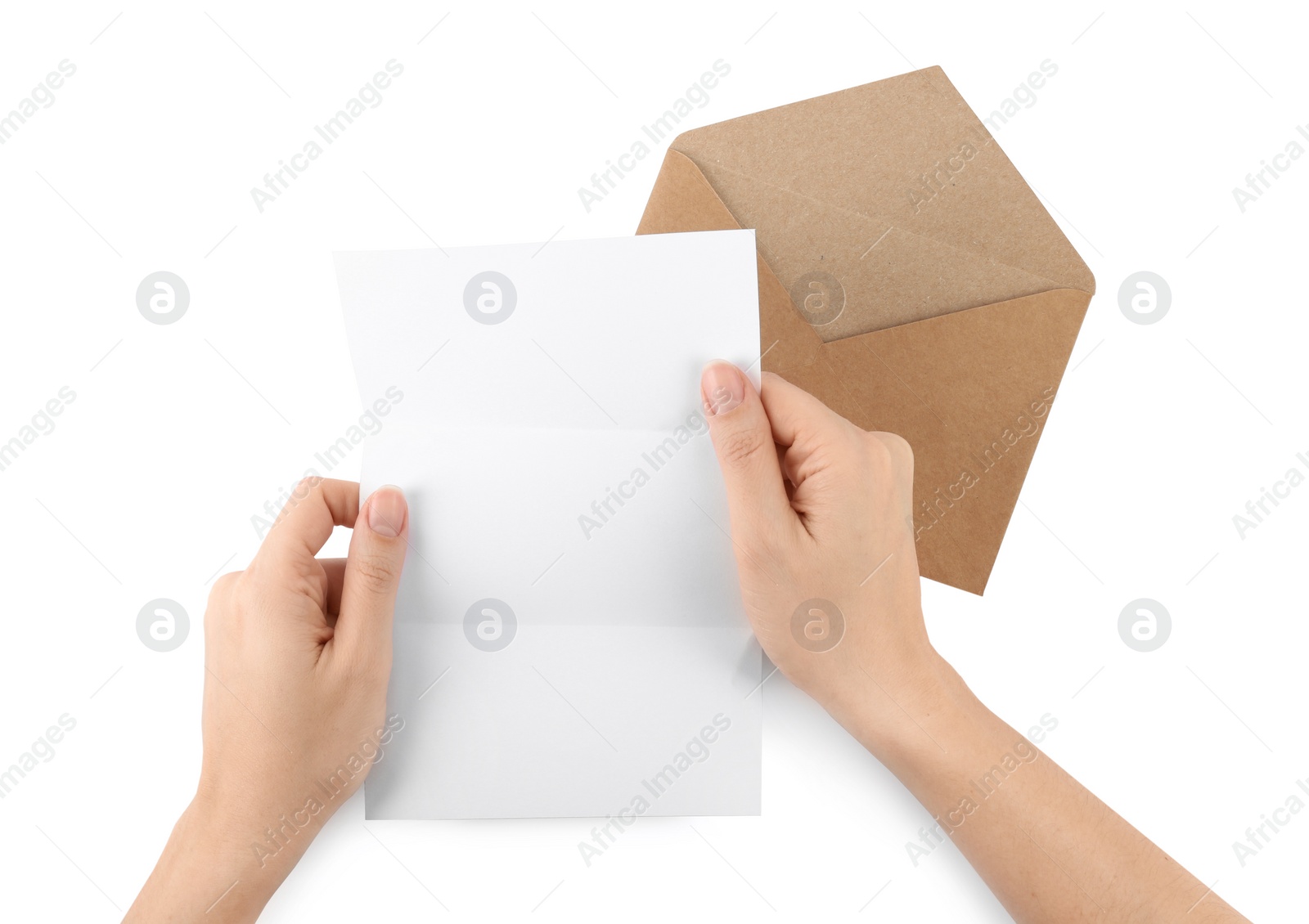 Photo of Woman holding blank letter on white background, top view