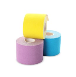 Many bright kinesio tape in rolls on white background