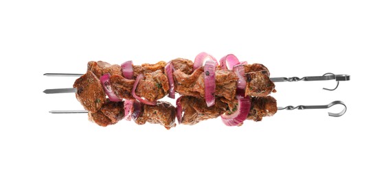 Photo of Metal skewers with delicious meat and onion on white background, top view