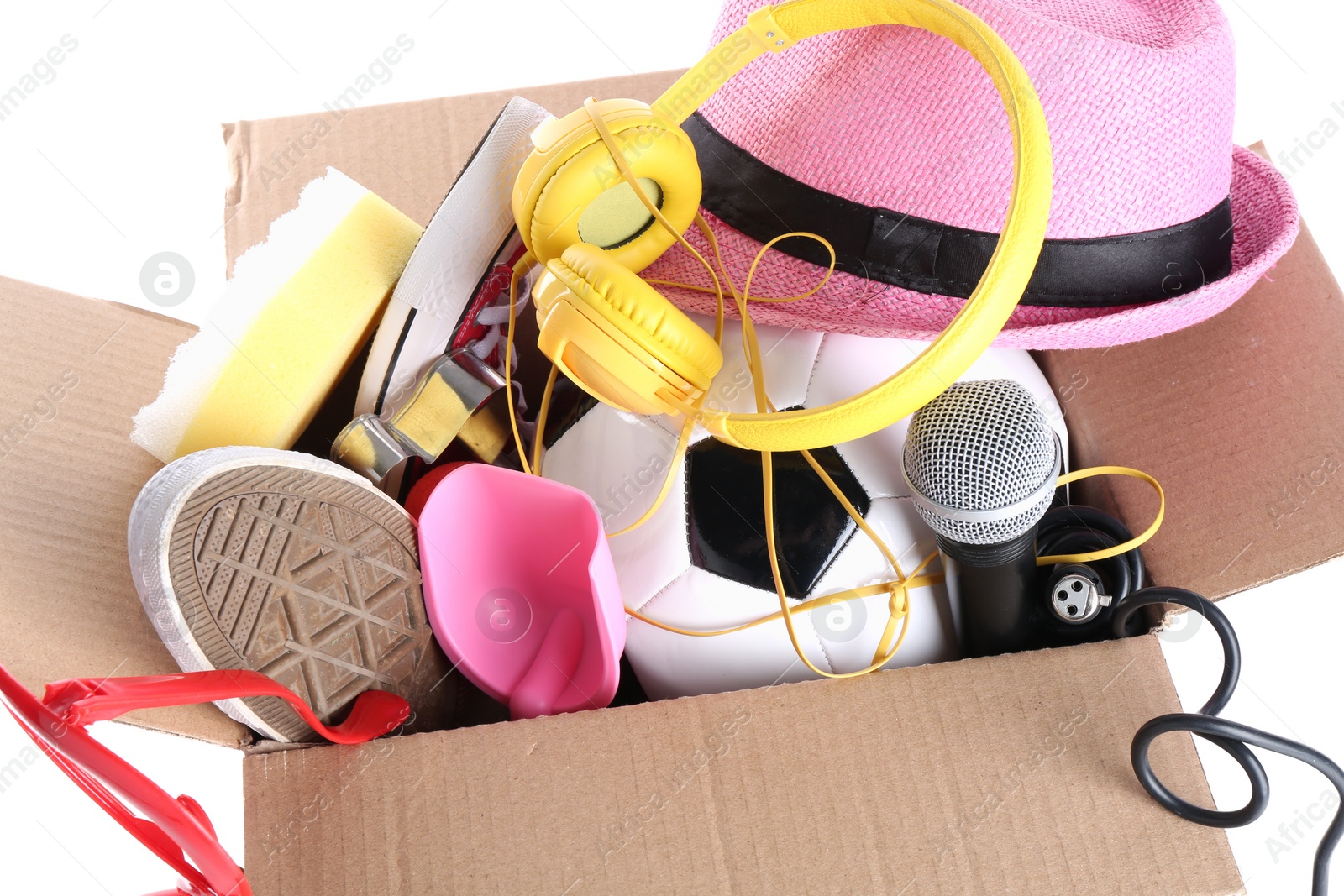 Photo of Box of unwanted stuff isolated on white