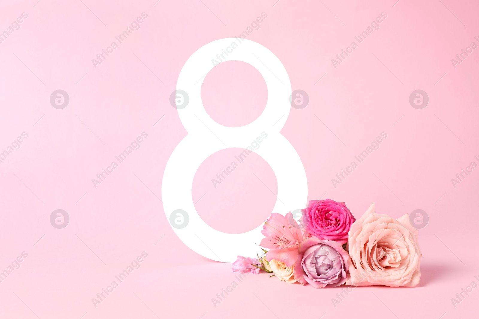 Photo of 8 March greeting card design with beautiful flowers on light pink background