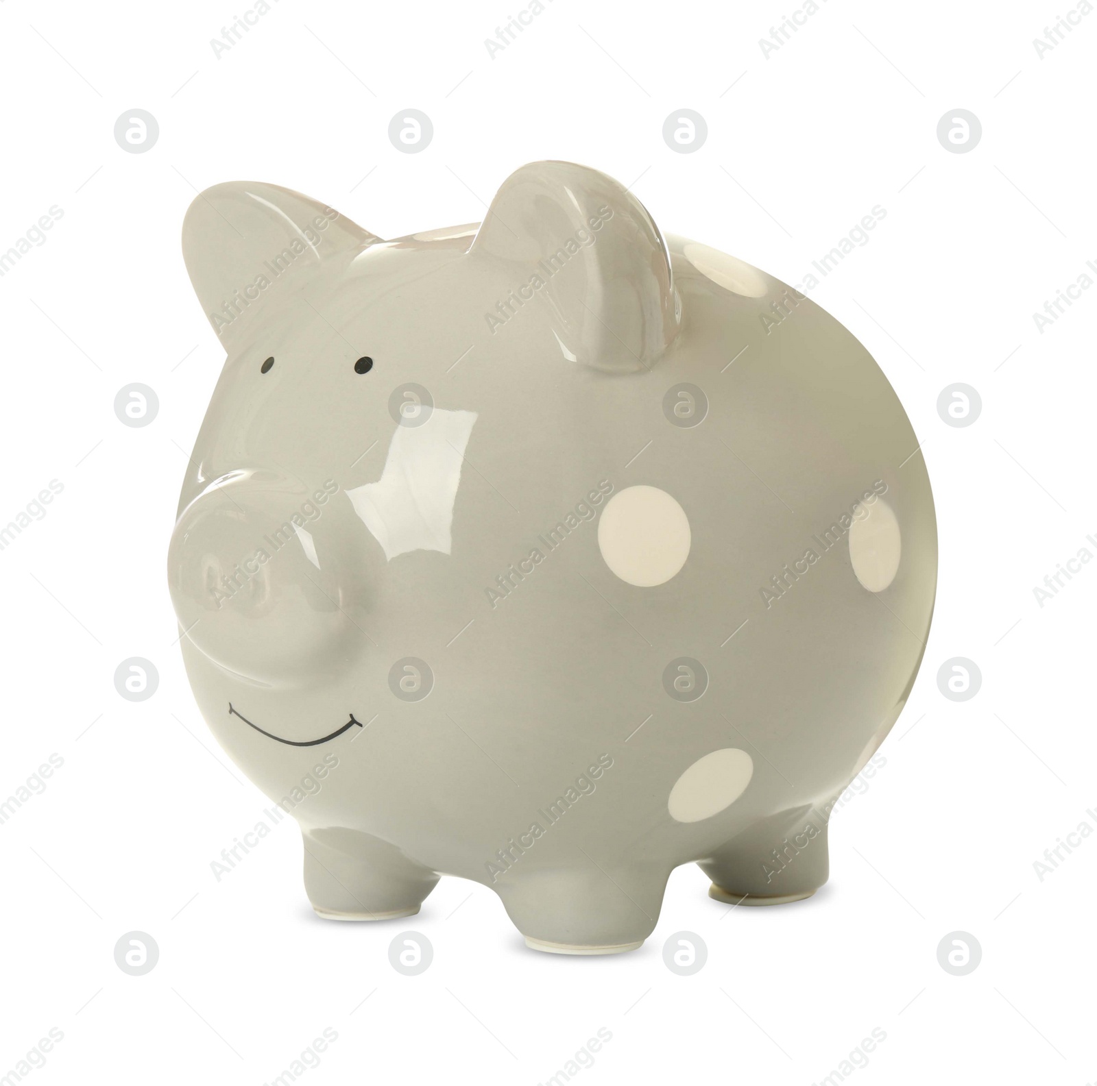 Photo of Piggy bank isolated on white. Saving money