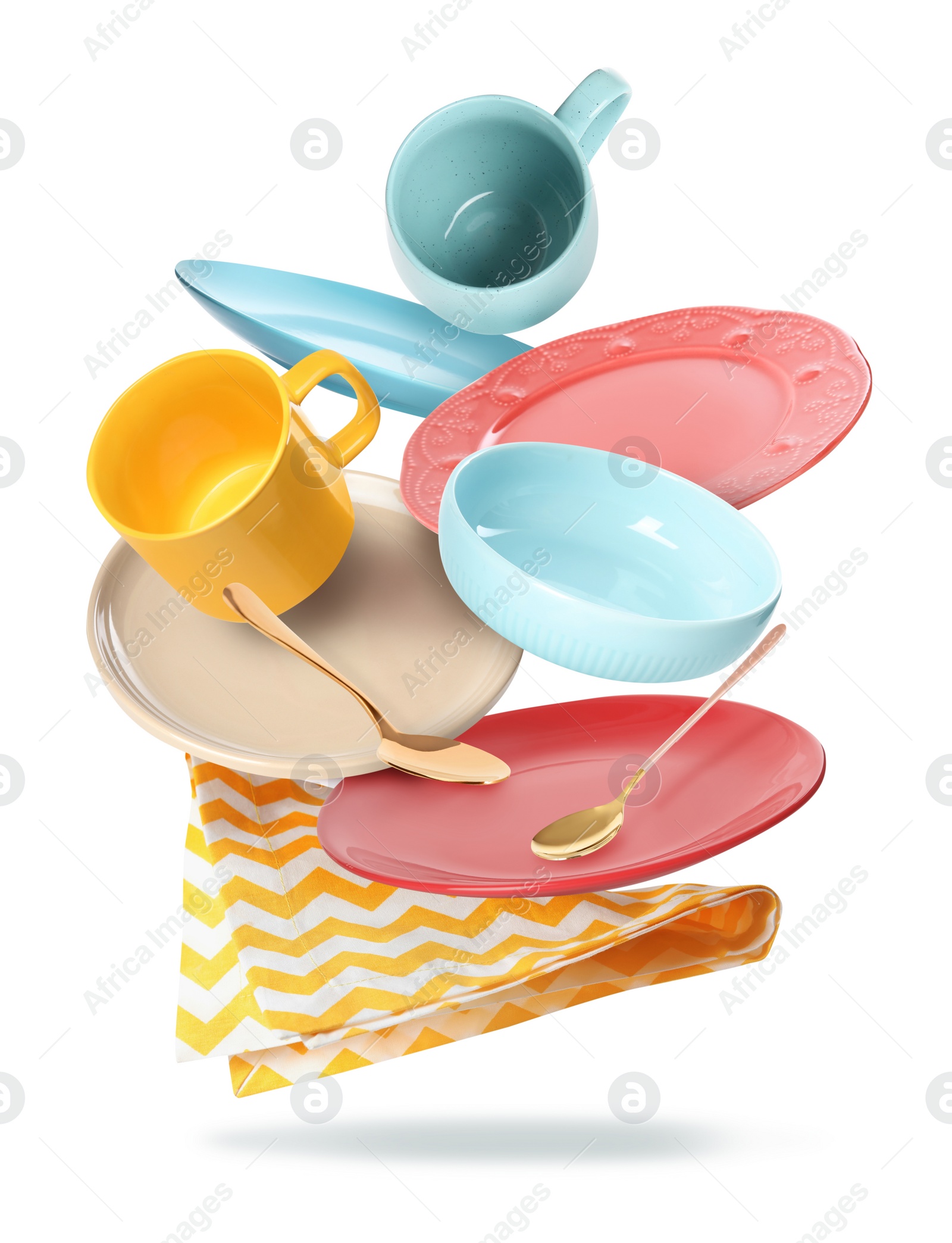 Image of Set of clean tableware and napkin in flight on white background