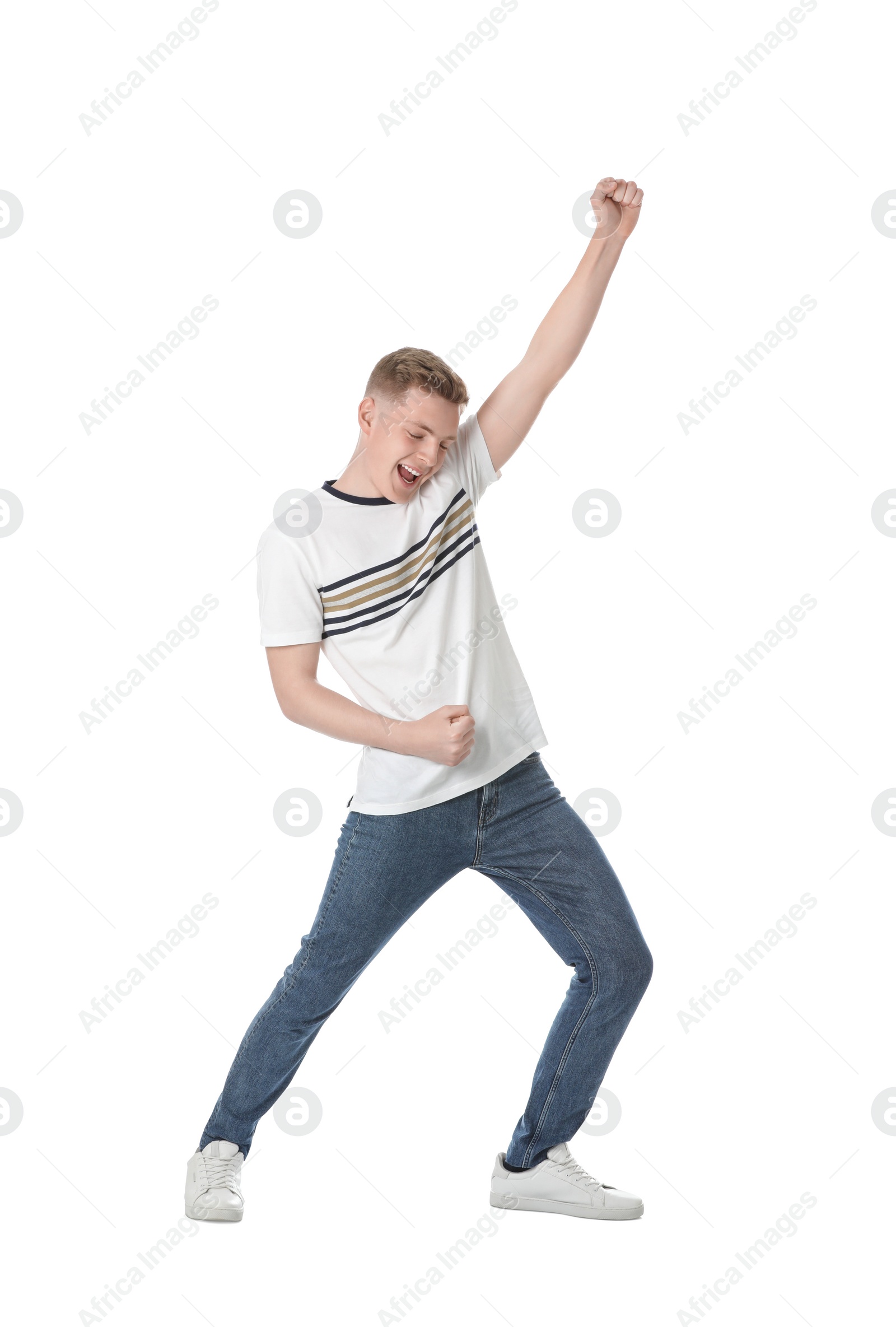 Photo of Full length portrait of happy teenage boy on white background