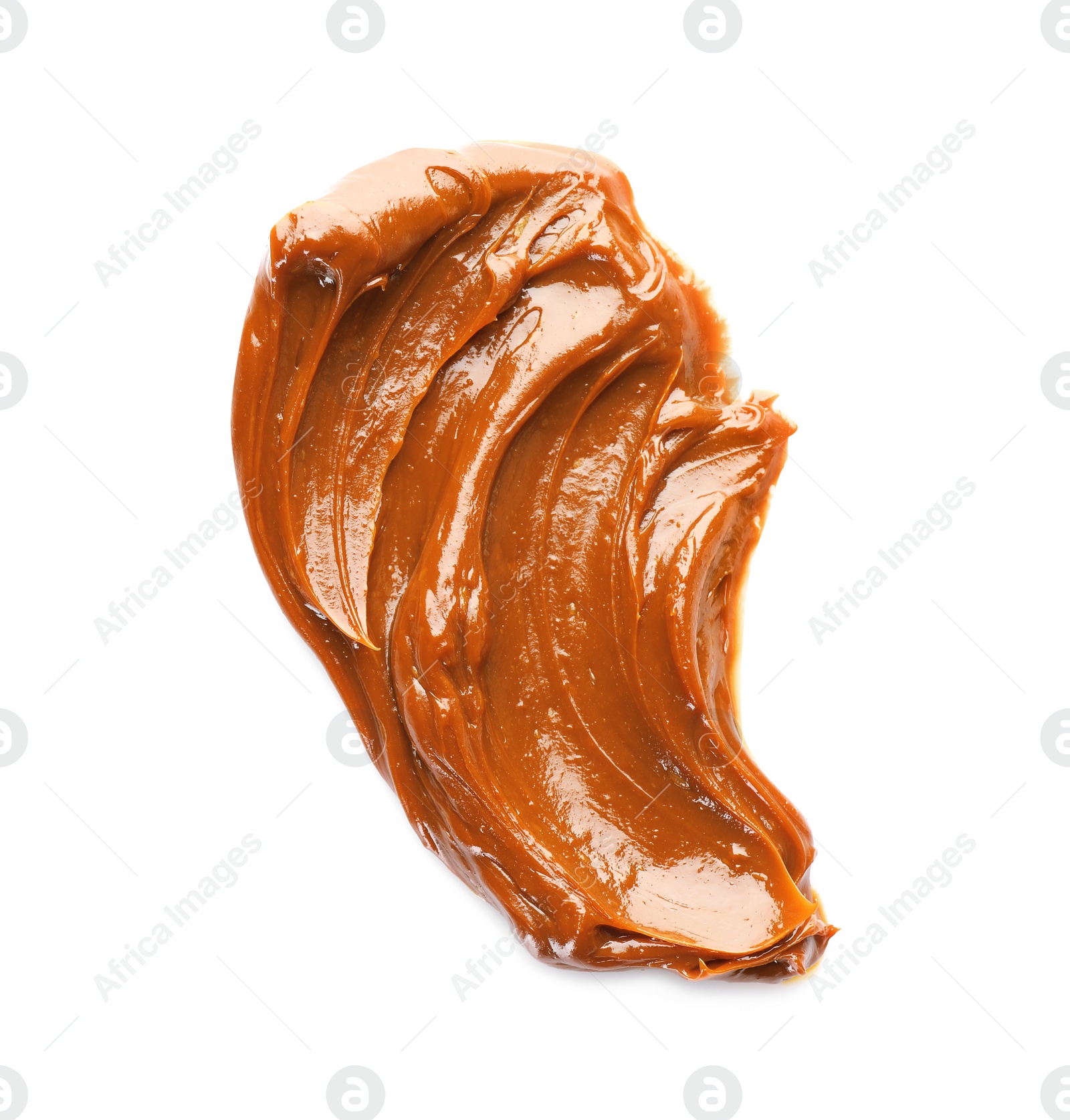 Photo of Tasty boiled condensed milk on white background, top view