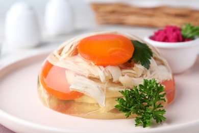 Photo of Delicious chicken aspic with vegetables on plate, closeup