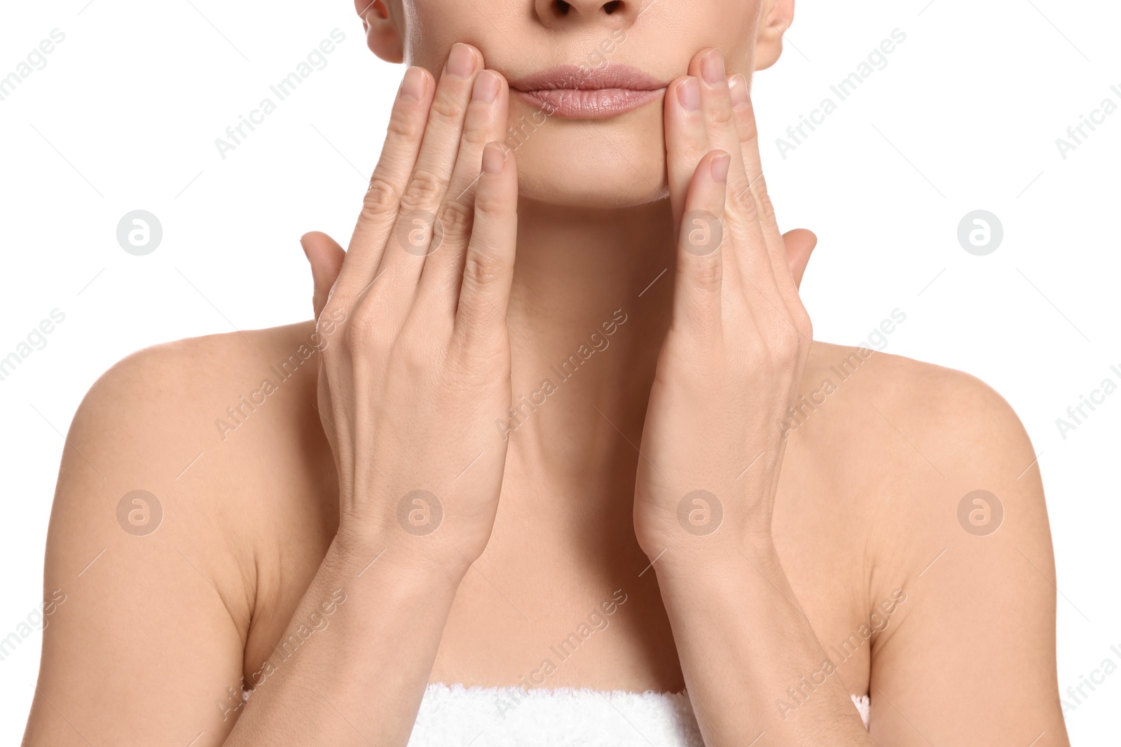 Photo of Woman massaging her face on white background, closeup