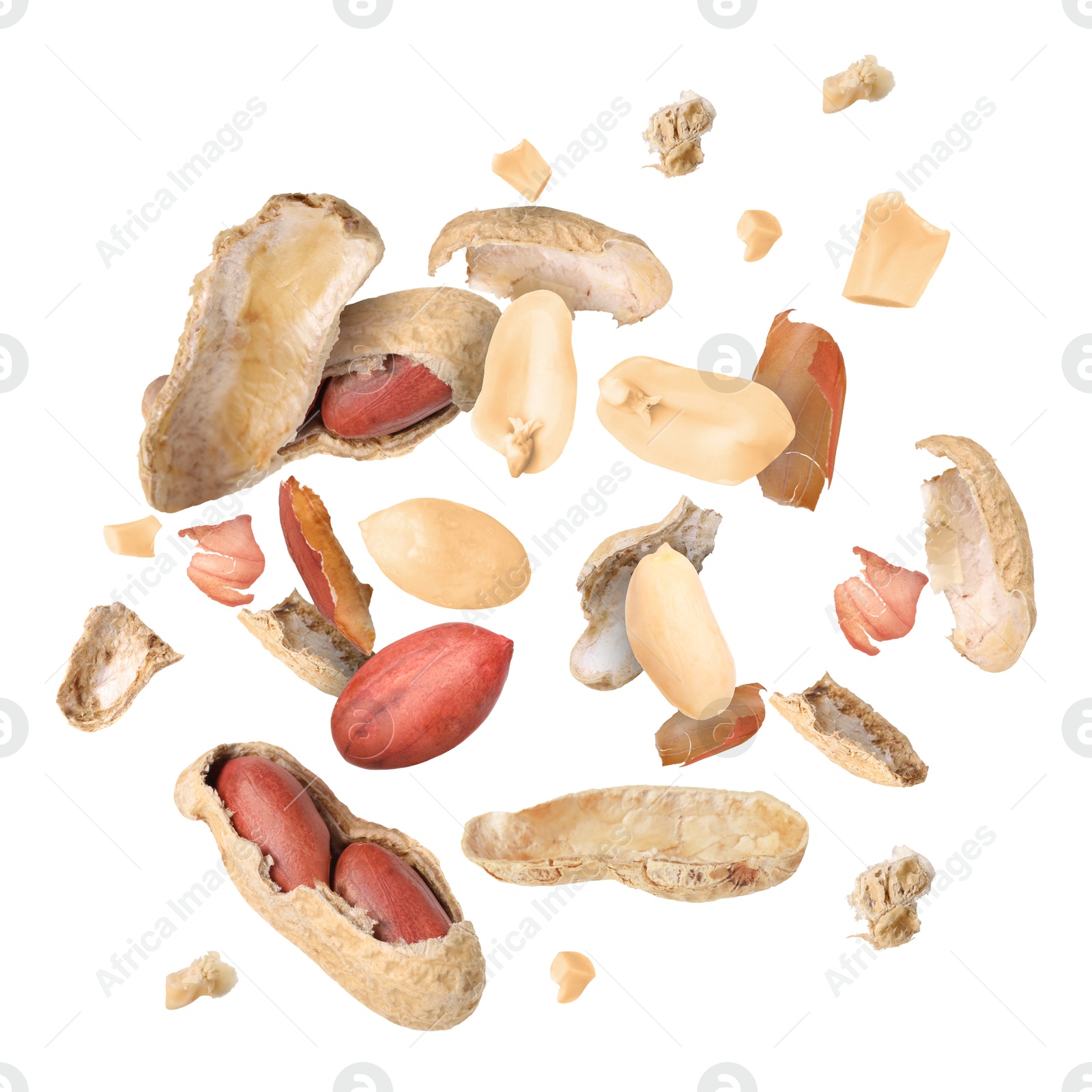 Image of Peanuts and crushed pods in air on white background