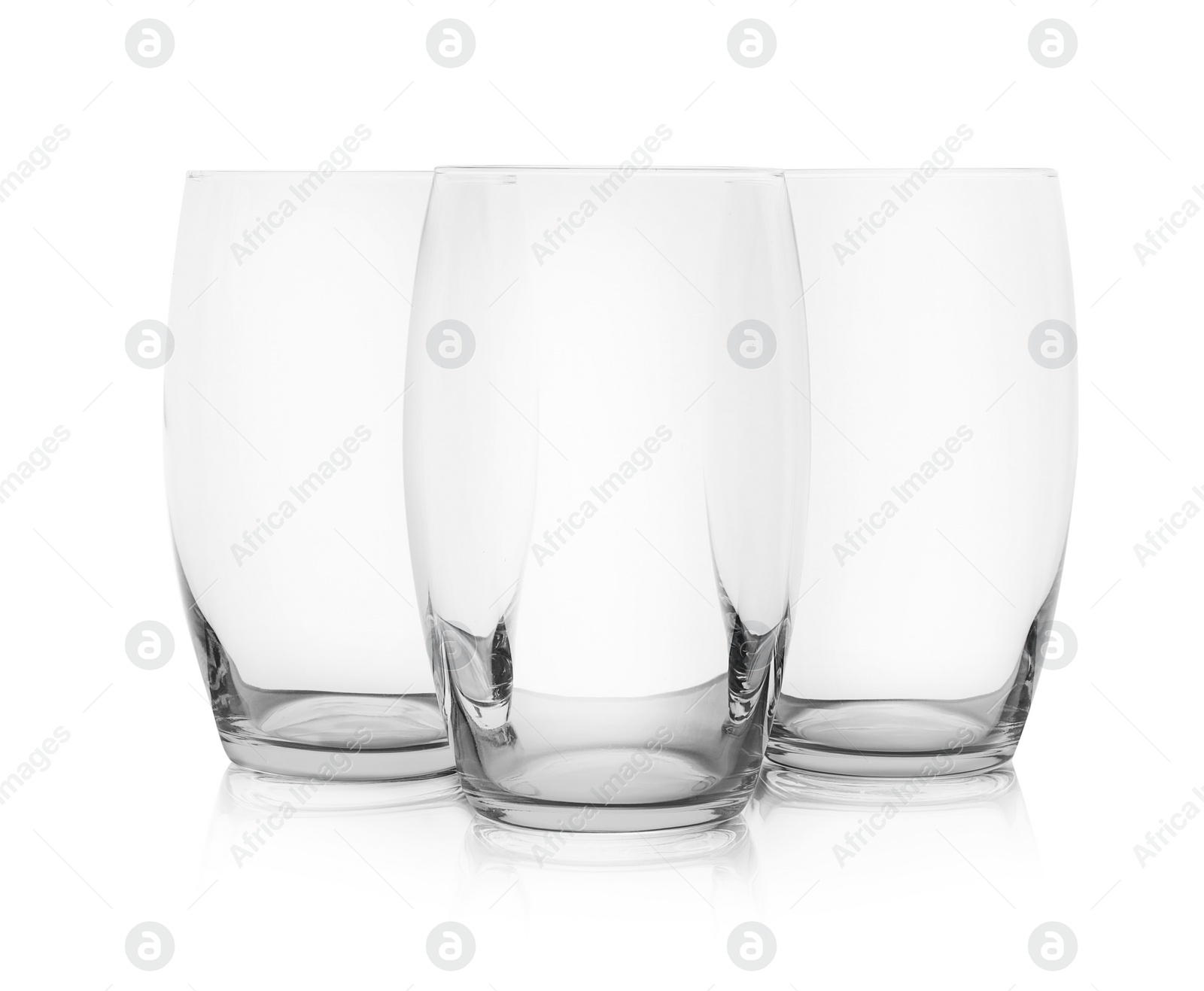 Photo of New empty clear glasses on white background