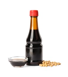 Natural soy sauce and soybeans isolated on white