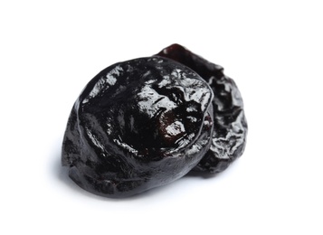 Photo of Tasty prunes on white background. Dried fruit as healthy snack