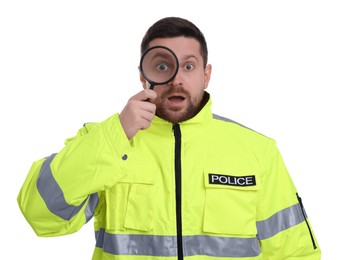 Surprised policeman looking through magnifier glass on white background