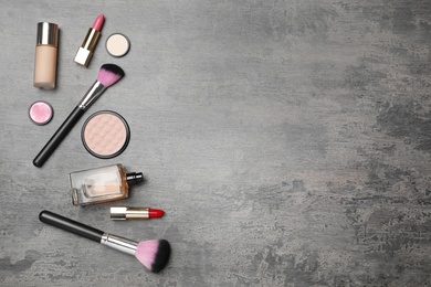 Photo of Flat lay composition with cosmetic products on grey background