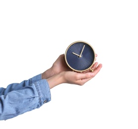 Young woman holding alarm clock on white background. Time concept