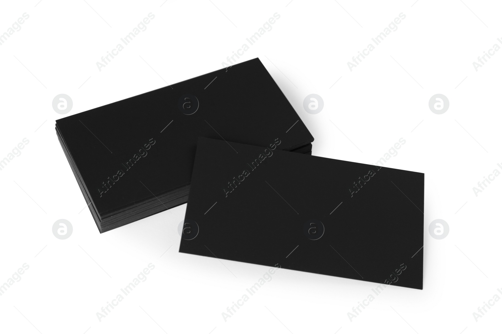 Photo of Blank black business cards on white background. Mockup for design