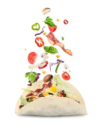 Image of Delicious tacos. Ingredients falling into tortilla on white background