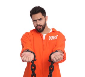 Prisoner in jumpsuit with chained hands on white background